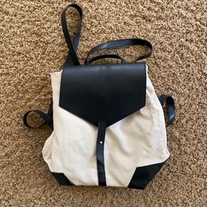 Cream and black little backpack